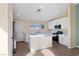 Modern kitchen with stainless steel appliances, white cabinets and an island at 7957 Lovely Pine Pl, Las Vegas, NV 89143