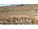 A street view showing multiple single Gathering homes with well-maintained yards and landscaping in a suburban neighborhood at 7957 Lovely Pine Pl, Las Vegas, NV 89143
