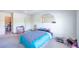 Cozy bedroom with carpet, ceiling fan, and standard furnishings at 7985 Simone Ave, Las Vegas, NV 89147