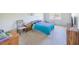 Bright bedroom with carpet, a window, and standard furnishings at 7985 Simone Ave, Las Vegas, NV 89147