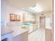 Functional kitchen with white appliances, ample counter space, and tile flooring at 7985 Simone Ave, Las Vegas, NV 89147