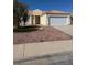 Charming single-story home with a well-kept yard and two-car garage, perfect for suburban living at 807 Airy Hill St, Henderson, NV 89015