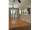 Open living room area with laminate flooring and an opening to the kitchen at 807 Airy Hill St, Henderson, NV 89015