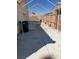 Concrete side yard with a metal frame canopy on one side at 807 Airy Hill St, Henderson, NV 89015