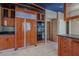 Gourmet kitchen featuring wooden cabinets, modern appliances, and a built-in oven at 8199 Pinnacle Peak Ave, Las Vegas, NV 89113