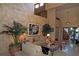 Grand living room featuring soaring ceilings, unique decor and neutral furniture at 8199 Pinnacle Peak Ave, Las Vegas, NV 89113