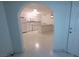 Bright kitchen featuring white cabinetry, granite counters, and modern appliances at 833 Hedge Way # 2, Las Vegas, NV 89110