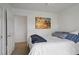 Bright bedroom featuring beach themed wall art and natural light at 9157 Acclamation Ct, Las Vegas, NV 89149