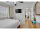 Bright bedroom with warm wood furniture and natural light at 9157 Acclamation Ct, Las Vegas, NV 89149