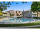 Inviting community pool with ample seating and shade, perfect for relaxing and socializing at 9157 Acclamation Ct, Las Vegas, NV 89149