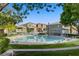 Inviting community pool with ample seating and shade, perfect for relaxing and socializing at 9157 Acclamation Ct, Las Vegas, NV 89149