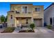 Charming two-story home featuring a small front yard and balcony at 9157 Acclamation Ct, Las Vegas, NV 89149
