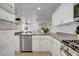 Open kitchen featuring stainless steel appliances and tile flooring at 9157 Acclamation Ct, Las Vegas, NV 89149
