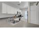 Bright kitchen featuring stainless steel appliances and a double sink at 9157 Acclamation Ct, Las Vegas, NV 89149