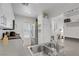 Bright kitchen featuring stainless steel appliances and a double sink at 9157 Acclamation Ct, Las Vegas, NV 89149