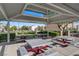Shaded picnic area featuring multiple tables for community gatherings, perfect for outdoor relaxation at 9157 Acclamation Ct, Las Vegas, NV 89149