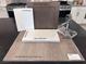 Selections include a modern faucet, quartz countertops, stainless steel appliances, and neutral color palette at 9233 Hudson Yards Ct, Las Vegas, NV 89148
