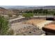 This picturesque mountain view features desert landscaping, a pedestrian tunnel and mountains in the background at 96 Saint Johns Wood Ave, Henderson, NV 89002