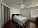 Spacious bedroom with hardwood floors and neutral walls that offer a serene retreat at 9628 Scrub Jay Ct, Las Vegas, NV 89148