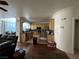 Open concept kitchen with a center island, modern appliances, and ample cabinet space at 9628 Scrub Jay Ct, Las Vegas, NV 89148