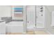 Spa-like bathroom with soaking tub and separate glass-enclosed shower at 10266 Sweet Holly Pl, Las Vegas, NV 89149
