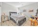 Comfortable bedroom with a queen bed and neutral décor, perfect for relaxation at 10266 Sweet Holly Pl, Las Vegas, NV 89149