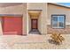 Inviting front entrance features brick-paved walkway, covered porch, and modern fixtures at 10266 Sweet Holly Pl, Las Vegas, NV 89149