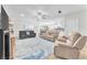 Spacious living room features comfortable seating, an open layout, and plenty of natural light at 10266 Sweet Holly Pl, Las Vegas, NV 89149