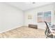 Bright office space with wood floors, window and desk area at 10266 Sweet Holly Pl, Las Vegas, NV 89149