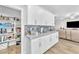 Functional kitchen with large pantry with granite counters, tile backsplash, and ample storage at 10266 Sweet Holly Pl, Las Vegas, NV 89149