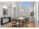 Chic dining room with pendant lights, modern table, and bright natural light at 10729 Grey Havens Ct, Las Vegas, NV 89135
