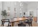 Bright dining room featuring large windows, modern furnishings, and an inviting atmosphere at 10729 Grey Havens Ct, Las Vegas, NV 89135