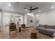 Spacious living area adjacent to kitchen, featuring modern furnishings and an open layout at 10729 Grey Havens Ct, Las Vegas, NV 89135