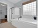 Bathroom featuring a separate shower and tub, offering a relaxing spa-like experience at 1116 Piazza Telle, Henderson, NV 89052
