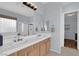 Bright bathroom with double sinks, a tub, and a separate shower, providing a spa-like experience at 1116 Piazza Telle, Henderson, NV 89052