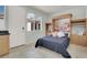 Spare bedroom features a murphy bed, custom built-ins, and tile flooring at 1116 Piazza Telle, Henderson, NV 89052