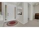 Bright entryway with tiled floors, white doors, and an elegant rug at 1116 Piazza Telle, Henderson, NV 89052