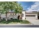 A single-story home featuring a well-maintained lawn, tile roof, neutral paint, and attached two-car garage at 1116 Piazza Telle, Henderson, NV 89052