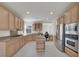 Spacious kitchen with stainless steel appliances, granite countertops, and a functional center island at 1116 Piazza Telle, Henderson, NV 89052
