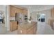 Updated kitchen featuring a center island, stainless steel appliances, and tile flooring at 1116 Piazza Telle, Henderson, NV 89052