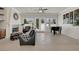 Spacious living room features a fireplace, tiled floors, and ample natural light at 1116 Piazza Telle, Henderson, NV 89052