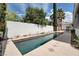 Backyard inground pool with concrete surround and privacy landscaping at 1116 Piazza Telle, Henderson, NV 89052