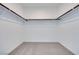 Well-organized walk-in closet with ample storage, providing convenience and tidiness at 1321 Crimson Sunbird Ave, North Las Vegas, NV 89084