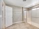 Bathroom featuring tiled floors, a glass-enclosed shower, and clean modern design at 139 Fulgora St, Henderson, NV 89074