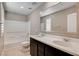Light and bright bathroom with double sink vanity and tub shower at 139 Fulgora St, Henderson, NV 89074