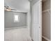 Bright bedroom features a ceiling fan, light grey walls, white trim and light wood-look flooring at 139 Fulgora St, Henderson, NV 89074