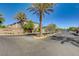 Gated community entrance with lush landscaping offers security and curb appeal, enhancing property value at 139 Fulgora St, Henderson, NV 89074