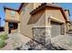Charming home with brick accents, a two-car garage, and a beautifully paved driveway and walkway at 139 Fulgora St, Henderson, NV 89074