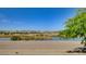 Picturesque lake view with lush vegetation and a tranquil atmosphere, enhanced by a clear blue sky at 139 Fulgora St, Henderson, NV 89074