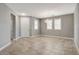 Bright and airy living room featuring neutral tones, tile flooring and recessed lighting at 139 Fulgora St, Henderson, NV 89074